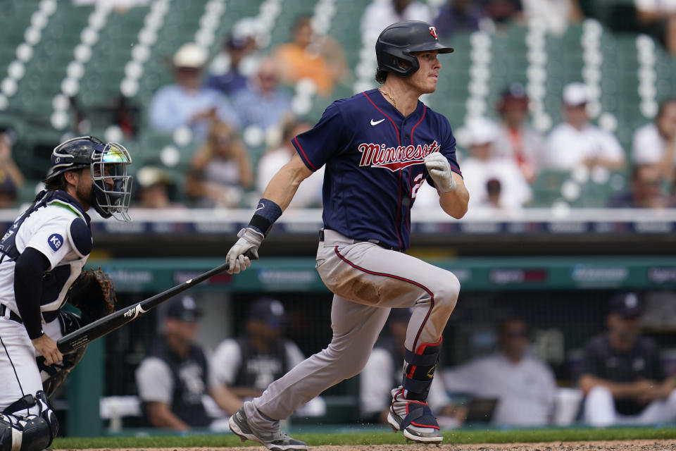 Minnesota Twins' Max Kepler hits a two-run single against the Detroit Tigers in the seventh inning of the first game of a baseball doubleheader in Detroit, Tuesday, May 31, 2022. (AP Photo/Paul Sancya)