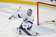 Tampa Bay Lightning goaltender Andrei Vasilevskiy looks back as a puck hit by Florida Panthers center Eetu Luostarinen goes in to score during the second period of an NHL hockey game, Monday, Feb. 6, 2023, in Sunrise, Fla. (AP Photo/Wilfredo Lee)