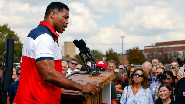 PHOTO: Herschel Walker, a Republican Senate candidate for Georgia, speaks at his 'United Georgia' campaign bus tour in Carrollton, Ga., Oct. 11, 2022.  (Arvin Temkar/Atlanta Journal-Constitution via AP)