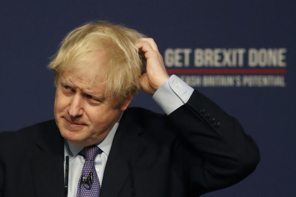 Britain's Prime Minister Boris Johnson presents the Conservative Party's Manifesto for the General Election campaign, in Telford, England, Sunday, Nov. 24, 2019. Britain goes to the polls on Dec. 12. (AP Photo/Frank Augstein)