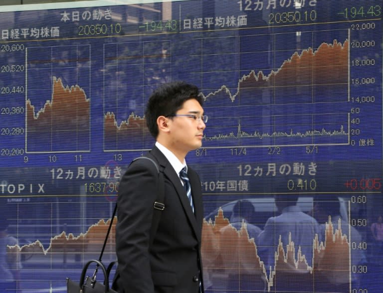 Asian stocks were mixed as gains on Wall Street drove trading in Tokyo but patchy US economic data fed wider uncertainty in the region