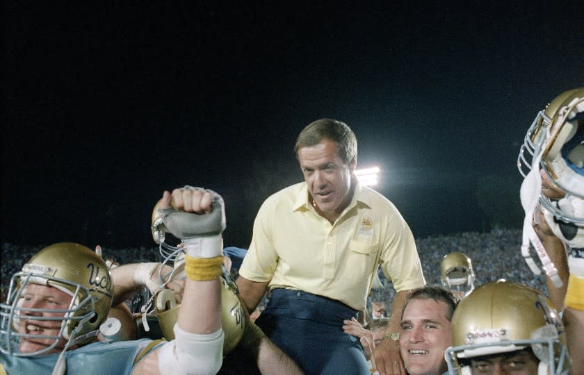 UCLA coach Terry Donahue is carried off the field by Bruin players after UCLA defeated Nebraska.