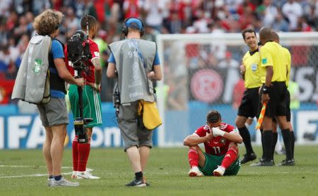 Soccer Football - World Cup - Group B - Portugal vs Morocco - Luzhniki Stadium, Moscow, Russia - June 20, 2018 Morocco's Faycal Fajr looks dejected after the match REUTERS/Maxim Shemetov