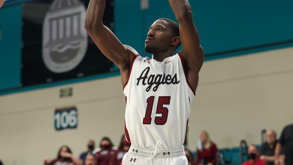 NMSU sophomore forward Mike Peake attempts a 3-pointer in the second half of the Aggies' 75-64 win over Davidson in the first round of the Myrtle Beach Invitational on 11/18/2021.