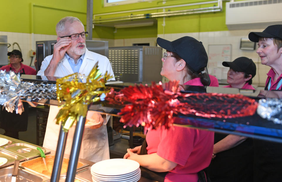 Labour leader Jeremy Corbyn joins canteen staff to help serve school dinners to staff and students at Bilton High School in Rugby, while on the General Election campaign trail.