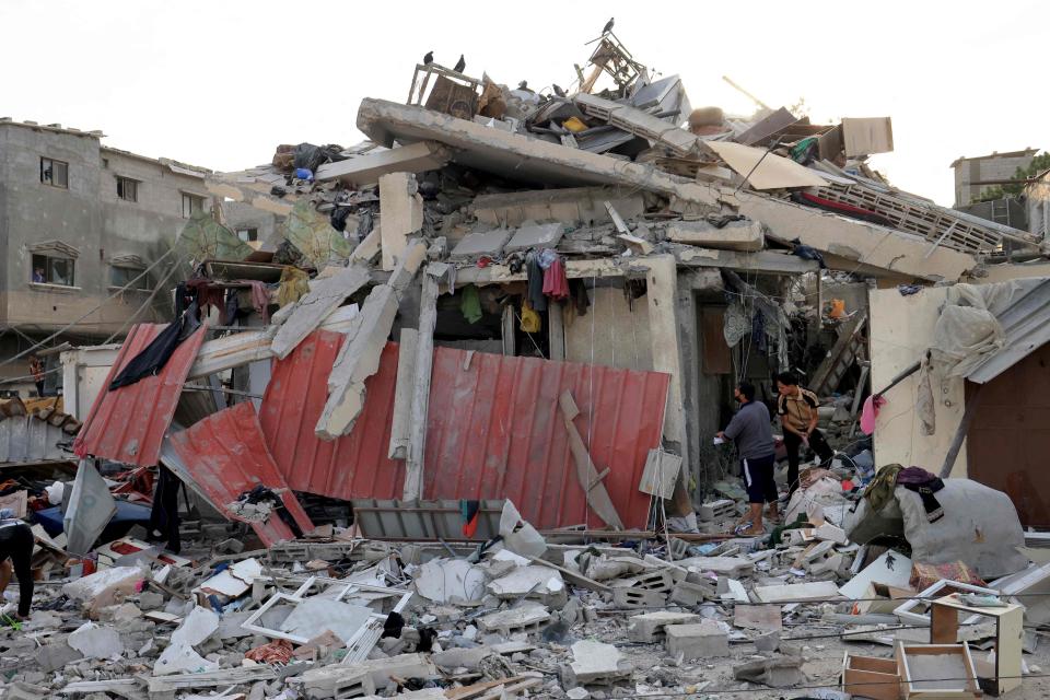 A building lies in ruins after Israeli airstrikes on southern Gaza (AFP via Getty Images)