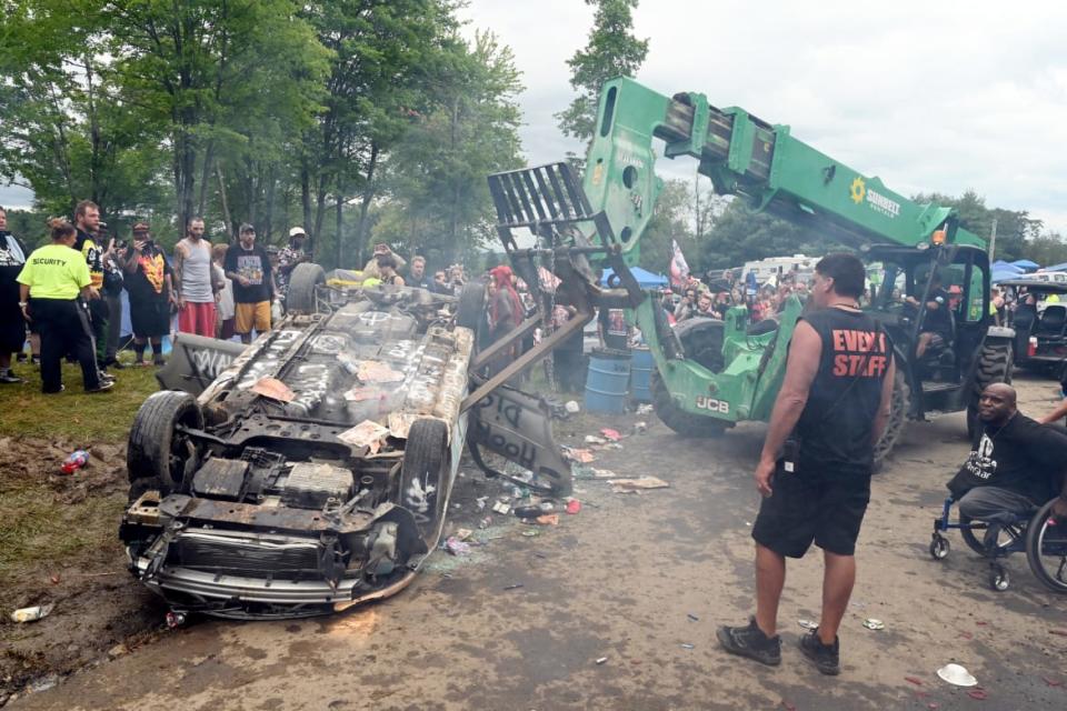 <div class="inline-image__caption"><p>A car gets totaled at the 2022 Gathering of the Juggalos in Thornville, Ohio. </p></div> <div class="inline-image__credit">Nate "Igor" Smith</div>