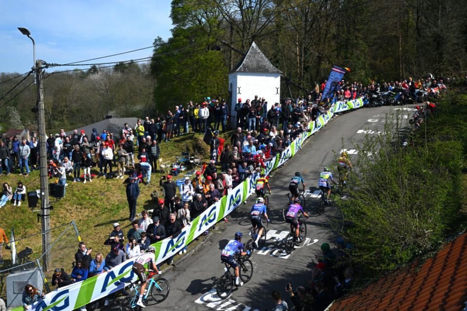 HUY BELGIUM  APRIL 19 Daryl Impey of South Africa and Team Israel  Premier Tech Lawrence Naesen of Belgium and AG2R Citron Team Georg Zimmermann of Germany and Team Intermarch  Circus  Wanty Jacob Hindsgaul of Denmark and UnoX Pro Cycling Team Sren Kragh Andersen of Denmark and Team AlpecinDeceuninck Ral Garca Pierna of Spain and Team Equipo Kern Pharma Johan Meens of Belgium and Team Bingoal WB and Jetse Bol of The Netherlands and Team BurgosBH compete in the breakaway climbing to the Cte de Cherav 195m while fans cheer during the 87th La Fleche Wallonne 2023 Mens Elite a 1943km one day race from Herve to Mur de Huy  UCIWT  on April 19 2023 in Huy Belgium Photo by Luc ClaessenGetty Images