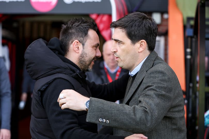 Roberto De Zerbi and Andoni Iraola embrace before Brighton takes on Bournemouth back in April. Both were both reportedly on Liverpool's shortlist before deciding upon Arne Slot