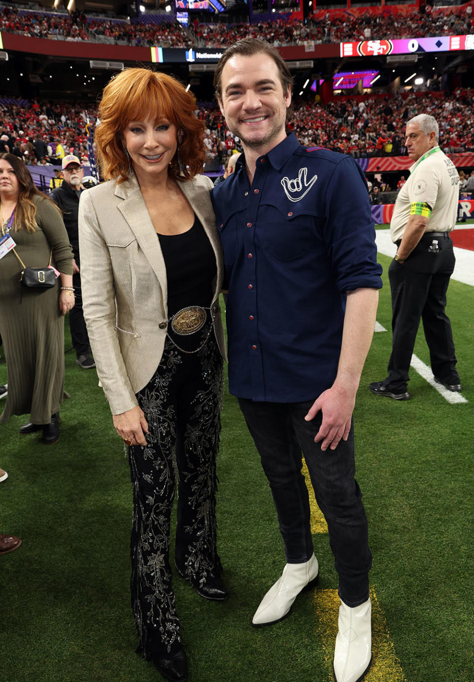 (L-R) Reba McEntire and Daniel Durant attend the Super Bowl LVIII Pregame at Allegiant Stadium on February 11, 2024 in Las Vegas, Nevada