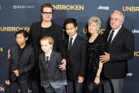 <p>Believe it or not, Angelina had chicken pox and had to miss the Dec. 2014 premiere of <em>Unbroken</em>. In her place, Brad and his parents, Jane and Bill, wrangled three of the six: Pax, Shiloh, and Maddox. (Photo: Gregg DeGuire/WireImage) </p>