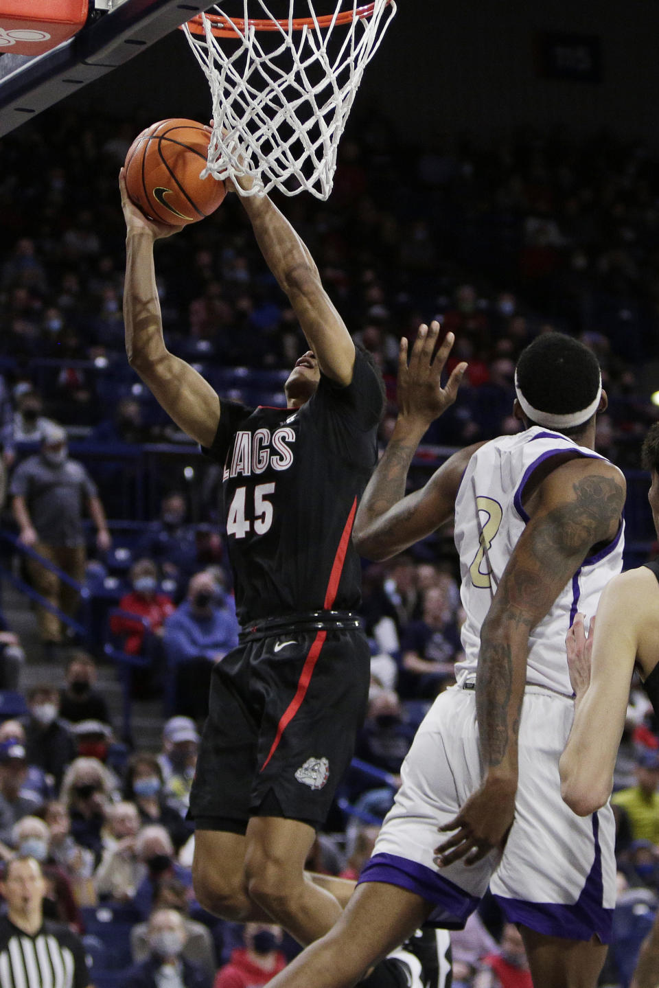 Gonzaga guard Rasir Bolton, left, shoots next to Alcorn State center Lenell Henry during the second half of an NCAA college basketball game, Monday, Nov. 15, 2021, in Spokane, Wash. (AP Photo/Young Kwak)