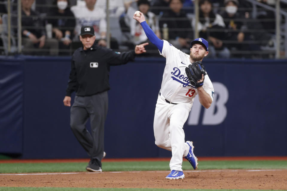 SEOUL, SOUTH KOREA - MARCH 21: Max Muncy #13 of the Los Angeles Dodgers makes a throw during the 2024 Seoul Series game between the San Diego Padres and the Los Angeles Dodgers at Gocheok Sky Dome on Thursday, March 21, 2024 in Seoul, California. (Photo by Yuki Taguchi/MLB Photos via Getty Images)