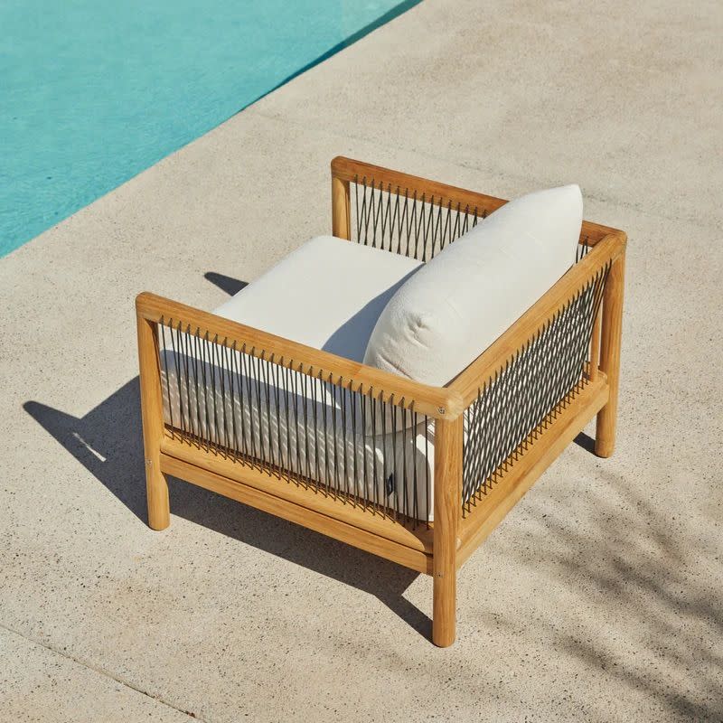 a wooden bench on a beach