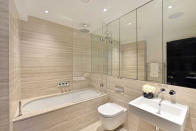 <p>All of the seven bathrooms are fitted out with italian marble and contemporary fixtures. Source: Rokstone </p>