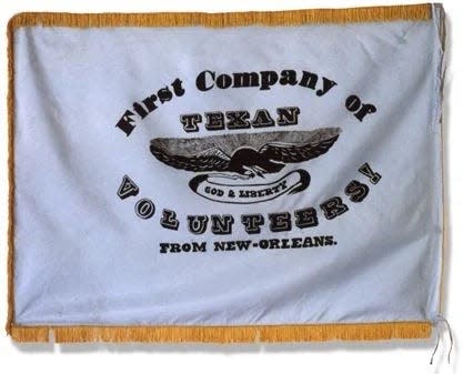 A photograph of the New Orleans Greys flag. The Greys, volunteers from the U.S., fought on the Texan side at the Siege of Bexar and the Alamo, among other battles.