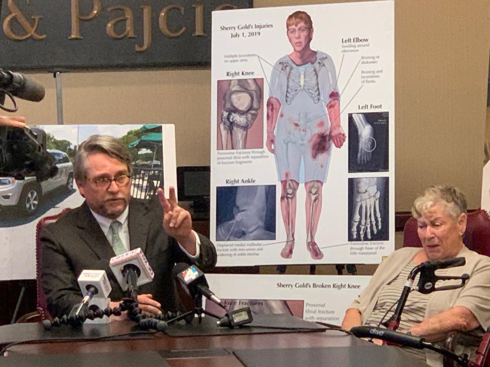 Attorney Curry Pajcic (left)  discusses client Sherry Gold's injuries that led to a Nassau County jury awarding her $9 million for injuries she received at a Starbucks off Sadler Road.