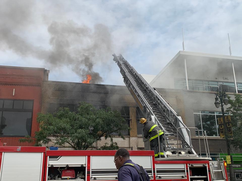 Firefighters are battling a blaze at The Woodward Bar & Grill in Detroit on Tuesday, June 14, 2022.