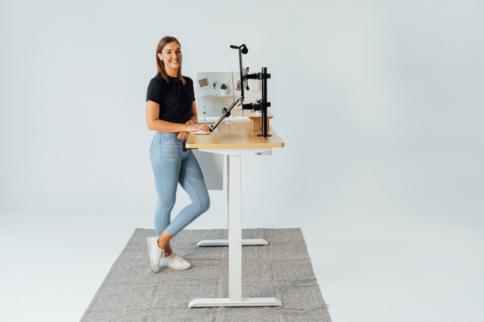 Woman standing at EverDesk