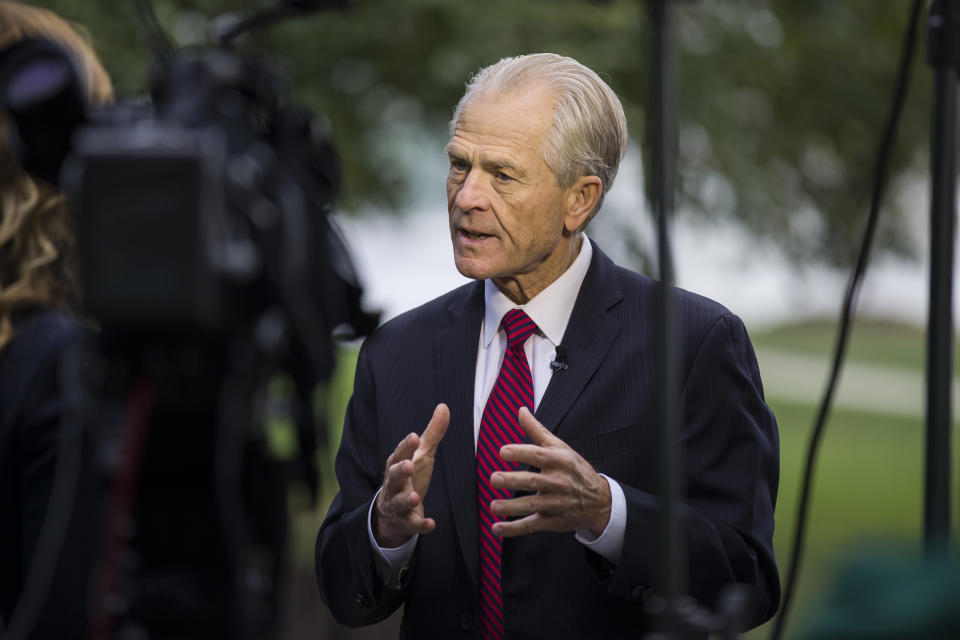 White House trade adviser Peter Navarro speaks during a television interview at the White House, Tuesday, Oct. 8, 2019, in Washington. (AP Photo/Alex Brandon)