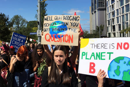 FILE PHOTO: Protesters demanding action on climate change gather in Melbourne, Australia March 15, 2019. REUTERS/Sonali Paul/File Photo