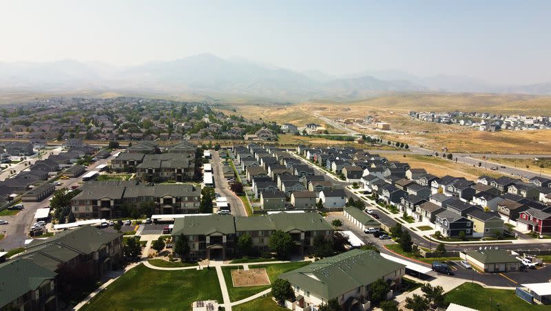 Looking west toward the Oquirrh mountains in West Jordan as heavy smoke fills the Salt Lake Valley on Wednesday, Aug. 30, 2023.