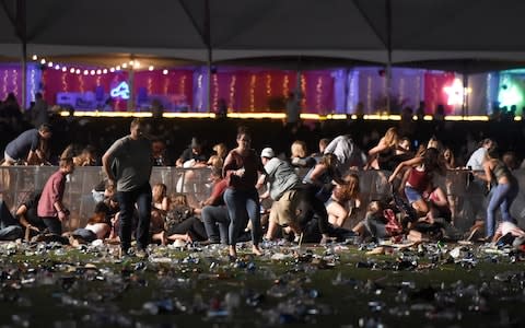 Festival-goers run for their lives in Las Vegas - Credit: David Becker/Getty