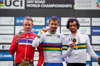 Cycling - UCI Road World Championships - Men Elite Road Race - Bergen, Norway - September 24, 2017 - Gold medalist Peter Sagan (C) of Slovakia, silver medalist Alexander Kristoff (L) of Norway and bronze medalist Michael Matthews of Australia pose on the podium. NTB SCANPIX/Cornelius Poppe via REUTERS