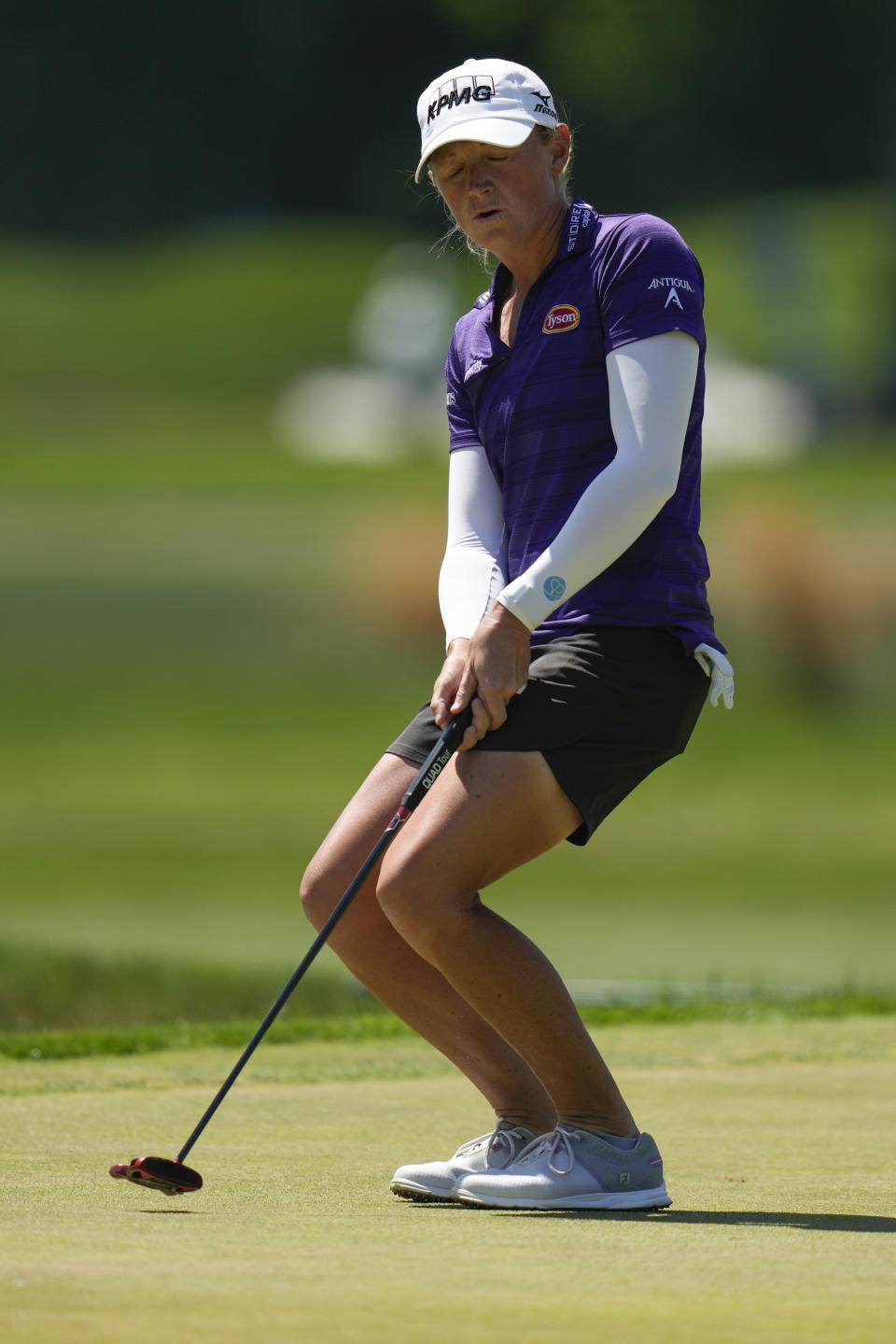 Stacey Lewis, of the United States, reacts after putting on the first hole during the final round of the LPGA Cognizant Founders Cup golf tournament, Sunday, May 14, 2023, in Clifton, N.J. (AP Photo/Seth Wenig)