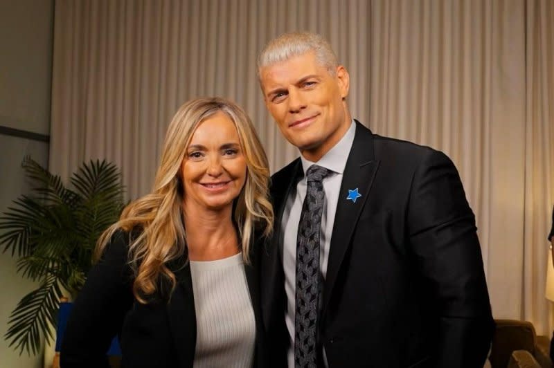 Leslie Motter, president and CEO of Make-A-Wish America, and WWE Superstar Cody Rhodes pose for a photo at WishMakers Wanted campaign launch on Thursday in New York City. The campaign is seeking one million wish-makers, including donors, volunteers, corporate partners and influencers, to help further the organization's mission. Photo courtesy of Make-A-Wish