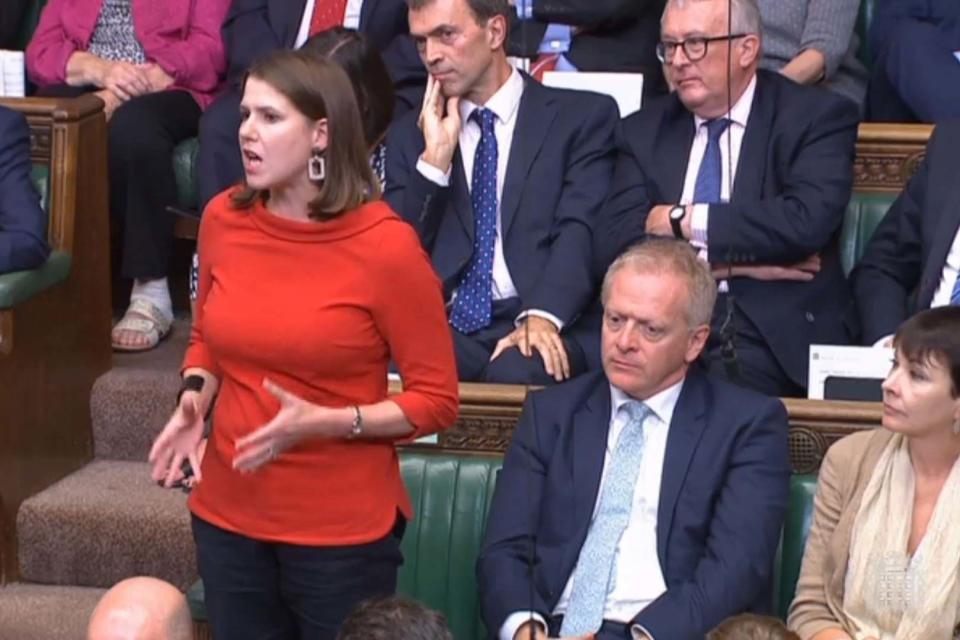 Lib Dem leader Jo Swinson next to Phillip Lee, who has defected from the Conservatives. (EPA)