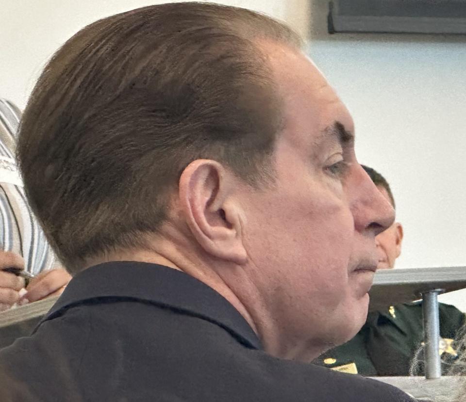 Florida Sen. Tom Wright, R-New Smyrna Beach, listens during a town hall on domestic violence in Daytona Beach on Tuesday. Wright was accused of accosting a shelter worker and was previously banned from the shelter for his behavior, according to the former CEO.