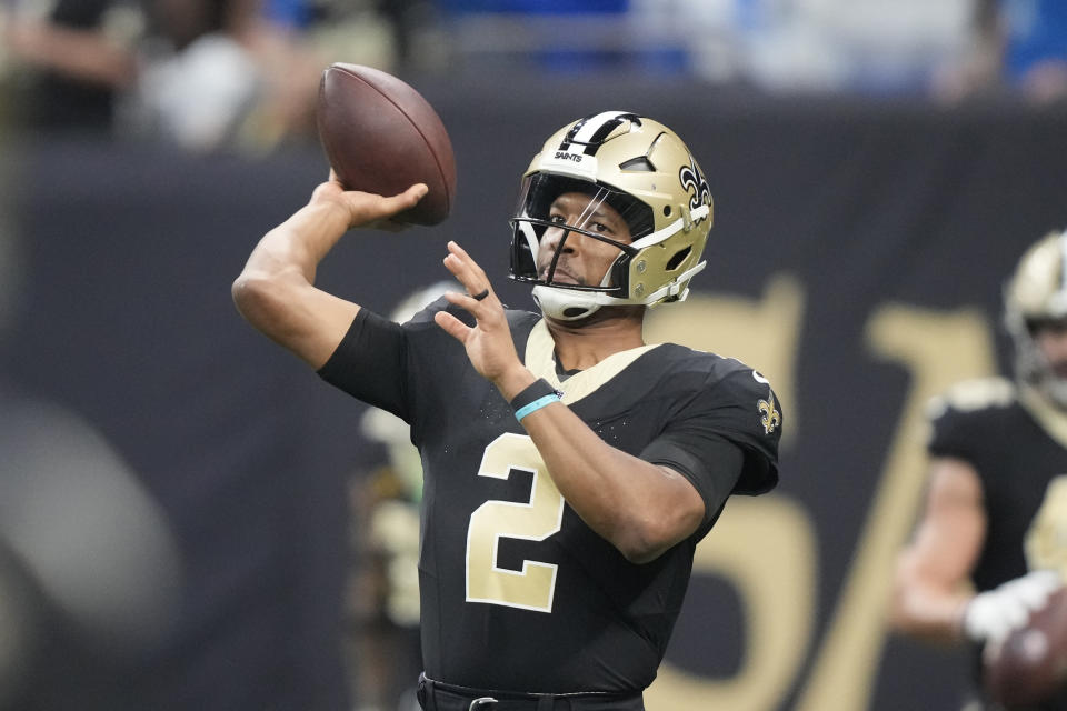 FILE - New Orleans Saints quarterback Jameis Winston warms up before the first half of an NFL football game against the Detroit Lions, Dec. 3, 2023, in New Orleans. A person with knowledge of the negotiations says the Cleveland Browns have agreed to sign Winston as a backup for Deshaun Watson. The person says Winston is getting a one-year deal worth up to $8.7 million. (AP Photo/Gerald Herbert, file)