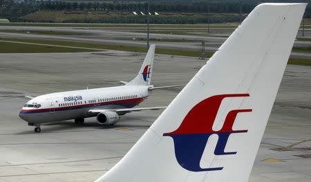 An aircraft of Malaysian Airline System taxis on the tarmac at Kuala Lumpur International Airport in Sepang in this February 26, 2007 file photo. REUTERS/Bazuki Muhammad/Files