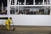 <p>An inaugural parade worker cleans up in front of President Donald Trump’s viewing stand in Lafayette Park, near the White House in Washington, Jan. 20, 2017. (Photograph by Sam Hodgson/The New York Times) </p>