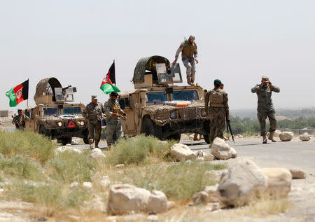 Afghan security forces prepare before leaving for an operation in Chaparhar district of Nangarhar province, Afghanistan May 24, 2017. Picture taken on May 24, 2017. REUTERS/Parwiz