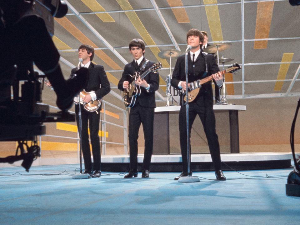 The Beatles performing on the ‘The Ed Sullivan Show’ in New York City in February 1964 (Universal History Archive/Univer)