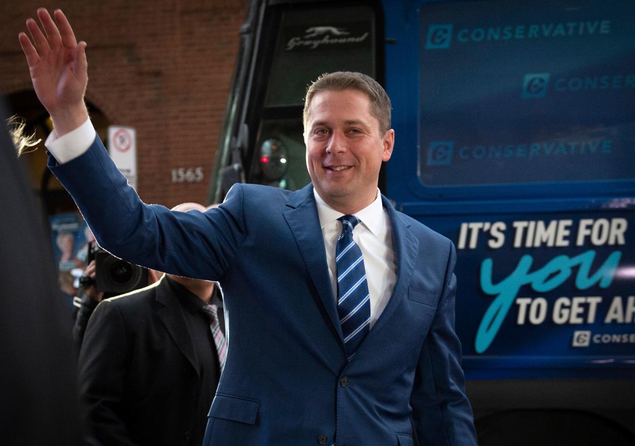 Leader of the Conservative Party of Canada Andrew Scheer waves as he arrives for the French debate for the 2019 federal election, the "Face-a-Face 2019" presented in the TVA studios, in Montreal (Getty Images)