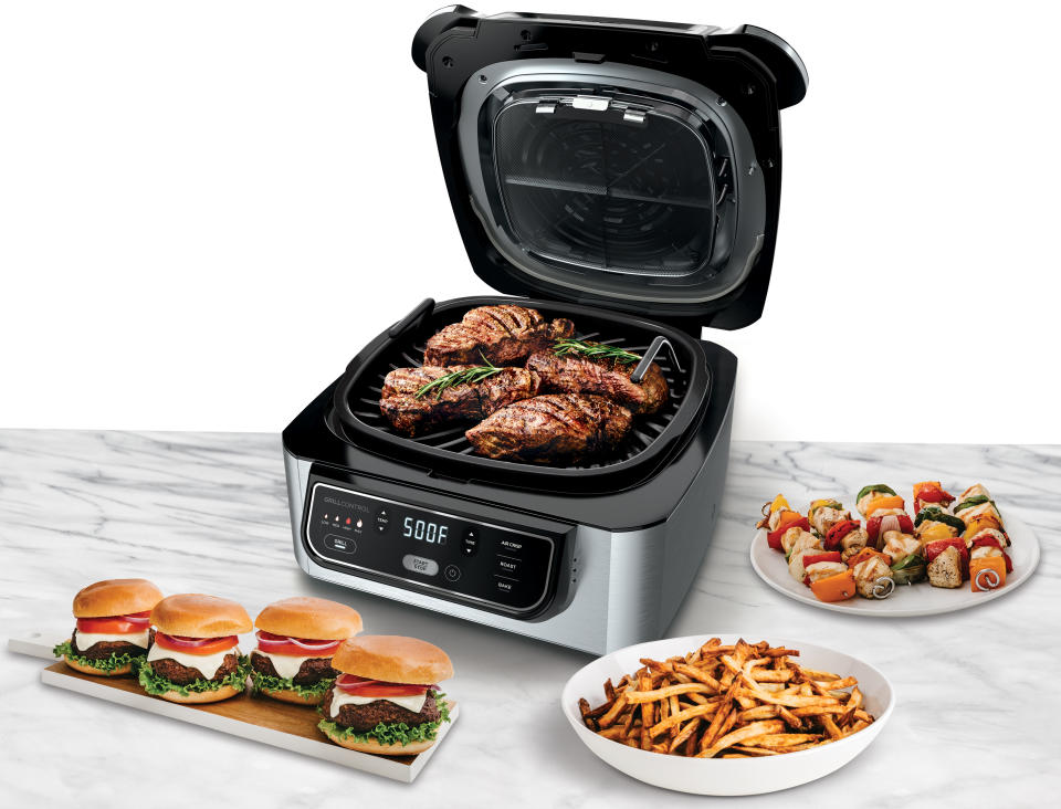 This snazzy meal machine is an air fryer and grill in one. (Photo: Walmart)