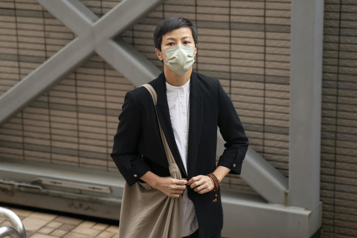 Hong Kong singer Denise Ho arrives at the West Kowloon Magistrates's Courts in Hong Kong, Friday Nov. 25, 2022. Hong Kong Cardinal Joseph Zen and five others were in court on Friday over charges of failing to register a now-defunct fund that aimed at helping people arrested in the widespread protests three years ago. (AP Photo/Anthony Kwan)