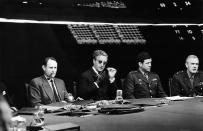 <a href="http://movies.yahoo.com/movie/dr-strangelove/" data-ylk="slk:DR. STRANGELOVE OR: HOW I LEARNED TO STOP WORRYING AND LOVE THE BOMB;elm:context_link;itc:0;sec:content-canvas" class="link ">DR. STRANGELOVE OR: HOW I LEARNED TO STOP WORRYING AND LOVE THE BOMB</a> (1964) <br>Directed by: <span>Stanley Kubrick</span> <br>Starring: <span>Peter Sellers</span>, <span>George C. Scott</span> and <span>Sterling Hayden</span>