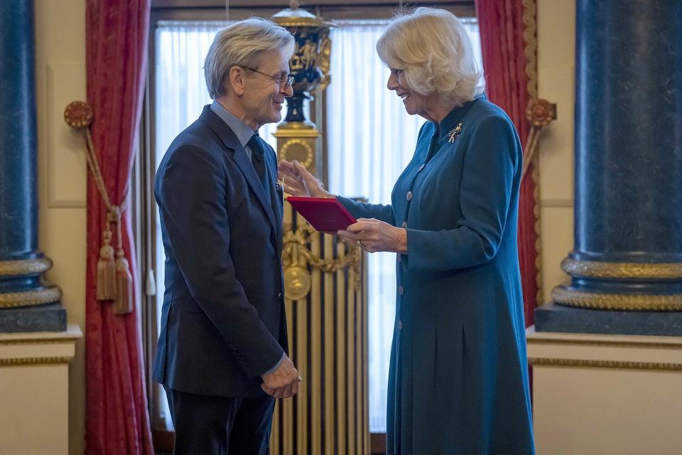 Britain's Camilla, the Queen Consort presents Mikhail Baryshnikov with the Royal Academy of Dance's highest honour, the Queen Elizabeth II Coronation Award, in recognition of his contribution to ballet and the wider world of dance, during a ceremony in the White Drawing Room at Buckingham Palace, London