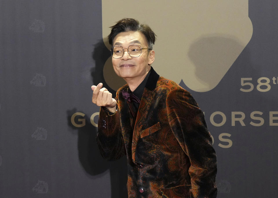 Singaporean actor Mark Lee arrives at the 58th Golden Horse Awards in Taipei, Taiwan, Saturday, Nov. 27, 2021. Lee is a guest at this year's Golden Horse Awards, one of the Chinese-language film industry's biggest annual events. (AP Photo/ Billy Dai)