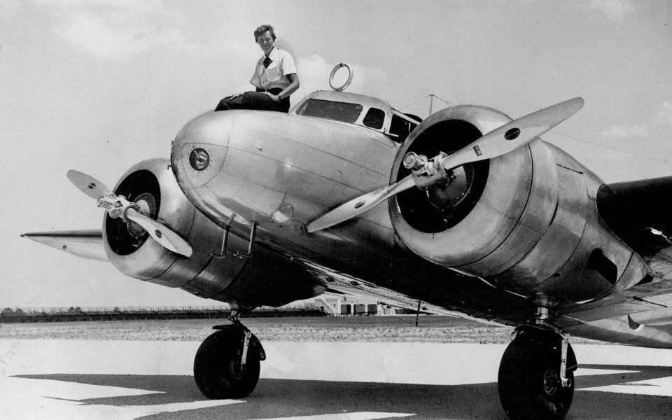 This 1937 photo shows Amelia Earhart before takeoff in Miami for an attempted round-the-world flight.