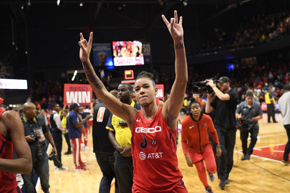 Washington Mystics guard Natasha Cloud gestures as she walks off the court after Game 2 of the team's WNBA playoff basketball series against the Las Vegas Aces, Thursday, Sept. 19, 2019, in Washington. The Mystics won 103-91. (AP Photo/Nick Wass)