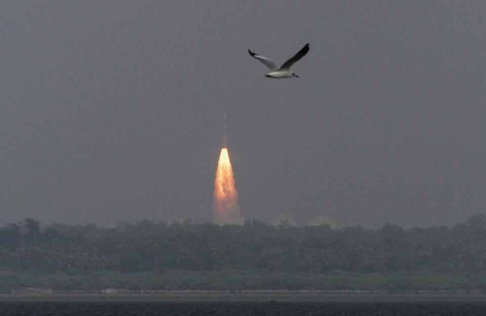 India's Polar Satellite Launch Vehicle, carrying the Mars orbiter, lifts off from the Satish Dhawan Space Centre in Sriharikota