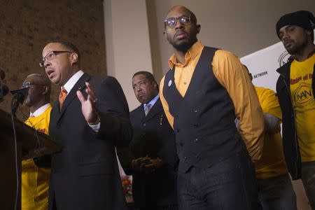 Michael Brown's family attorney Anthony Gray (L) speaks during an announcement for Justice Disciple volunteers on the ground for when the Ferguson grand jury decision is announced at the Greatest St. Mark's Family Church in Ferguson, Missouri November 21, 2014. REUTERS/Adrees Latif