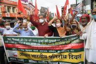 General secretary of CPI-ML Dipankar Bhattacharya demonstrating with party supporters at Dak Bungalow crossing in protest against recently passed farm bills, on September 25, 2020 in Patna, India. The two bills - the Farmers (Empowerment and Protection) Agreement on Price Assurance and Farm Services Bill, 2020 and the Farming Produce Trade and Commerce (Promotion and Facilitation) Bill, 2020 - were passed by the Rajya Sabha despite uproar and strong protest by the Opposition parties in the house. (Photo by Santosh Kumar/Hindustan Times via Getty Images)