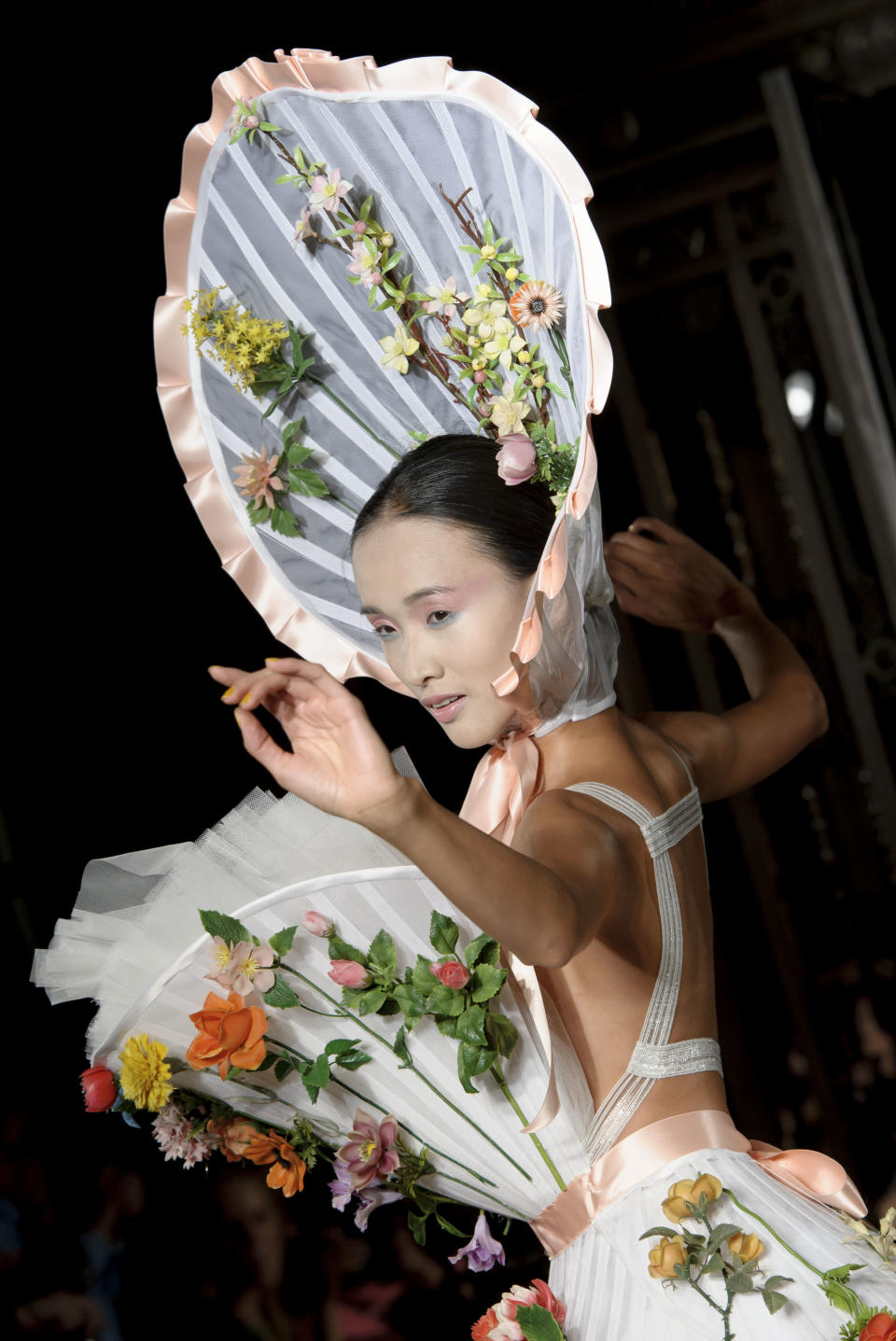 A model wears a design created by Pam Hogg during London Fashion Week Spring/Summer 2014, at the Freemasons' Hall in central London, Monday, Sept. 16, 2013. (Photo by Jonathan Short/Invision/AP)