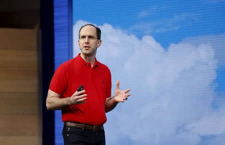 Scott Guthrie, executive vice president of the Cloud and Enterprise group at Microsoft, speaks at the Microsoft Build in San Francisco, California April 29, 2015. REUTERS/Robert Galbraith